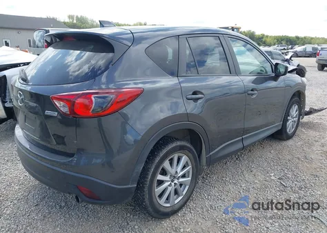 2015 Mazda Cx-5 Touring z USA, uszkodzony, nr VIN JM3KE4CY2F0519912